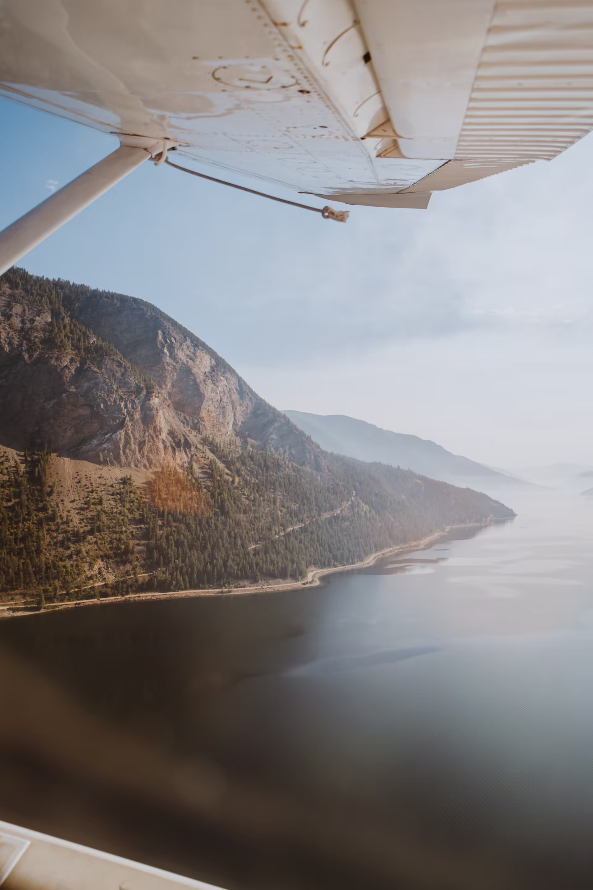 Ridgeline over the Okanagan seen from under a wing
